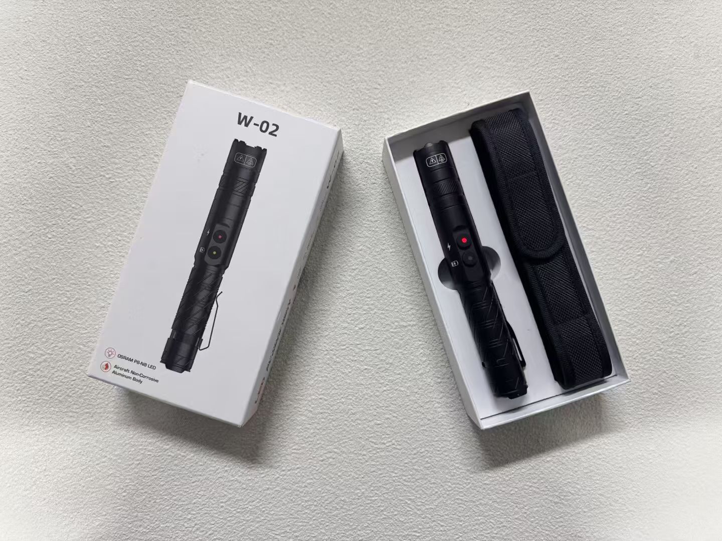金刚黑W-02多功能防身手电筒_高压电击防狼电棒_女子防身器材强光照明电击棍 - 详情图1